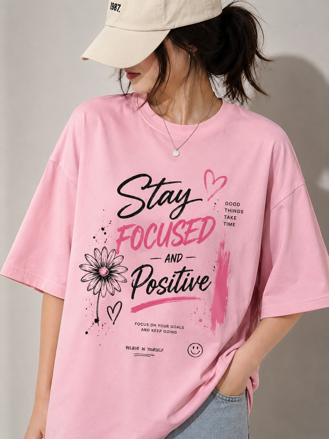 women’s oversized pink graphic T-shirt